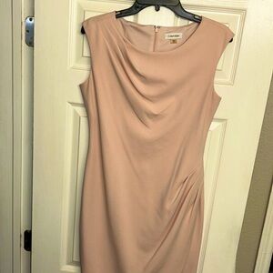 Women’s Calvin Klein light pink knee length dress with draping size 6 medium